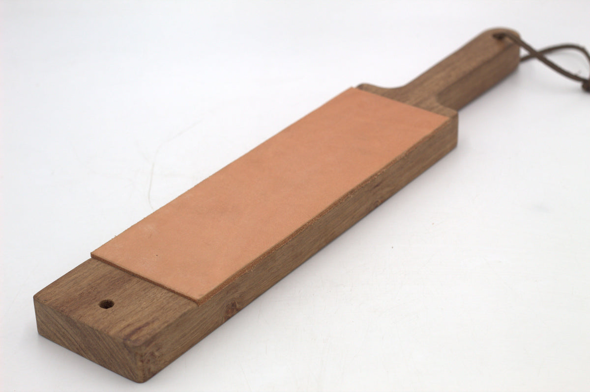 A wooden shaving horse with a leather strap, featuring the Netjies brand logo.
