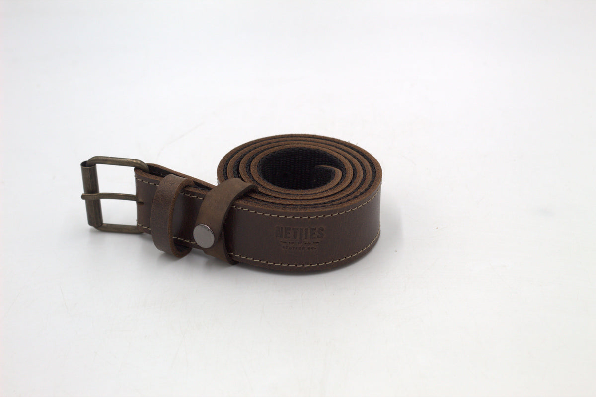 A brown leather belt with a metal buckle, placed against a white background.